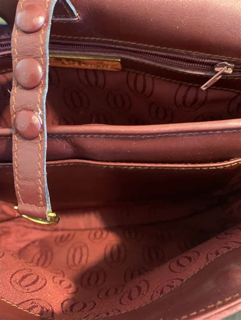 how to authenticate cartier bag.